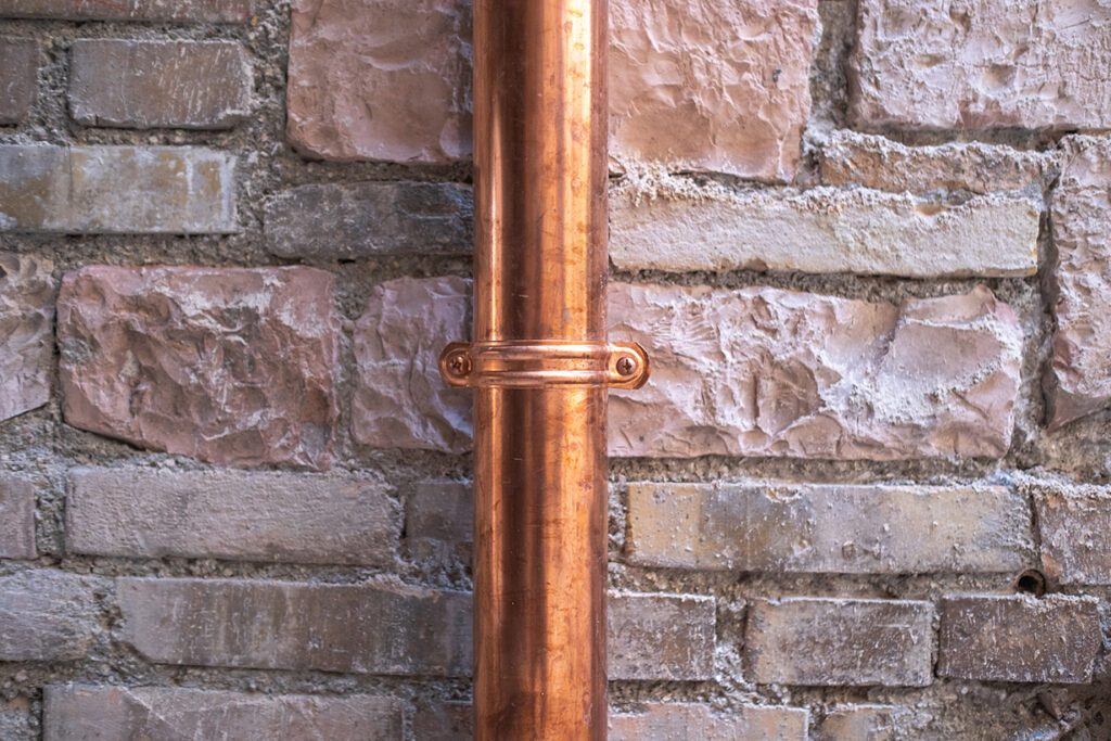 Copper gutter and downspout installation provide a unique look for your home that adds character and curb appeal.
