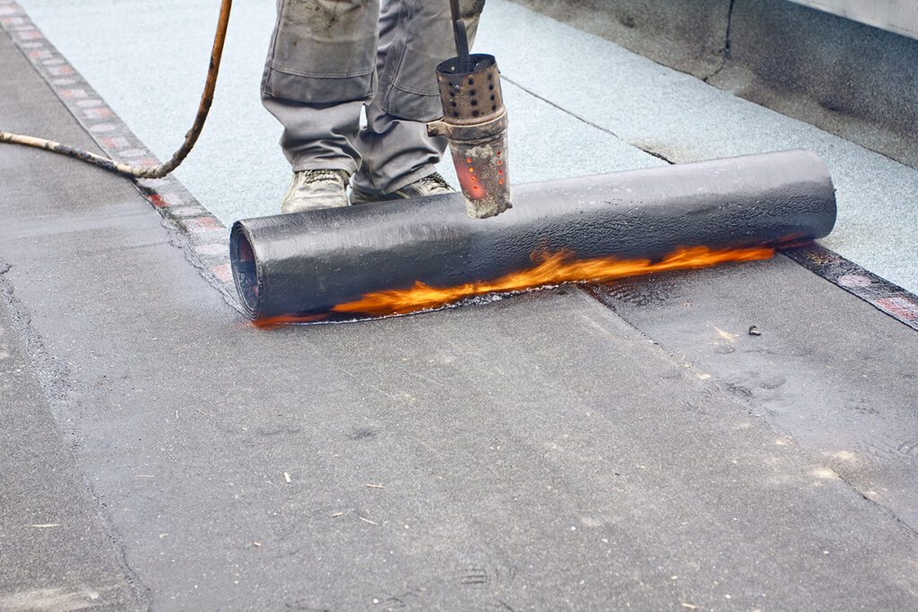 Roofing contractor uses heat fusion in the installation and replacement of flat roof