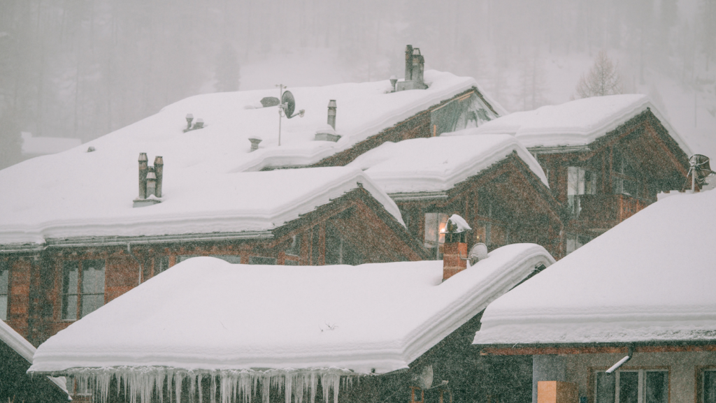 remote community in Pennsylvania with homes experiencing common winter roofing problems